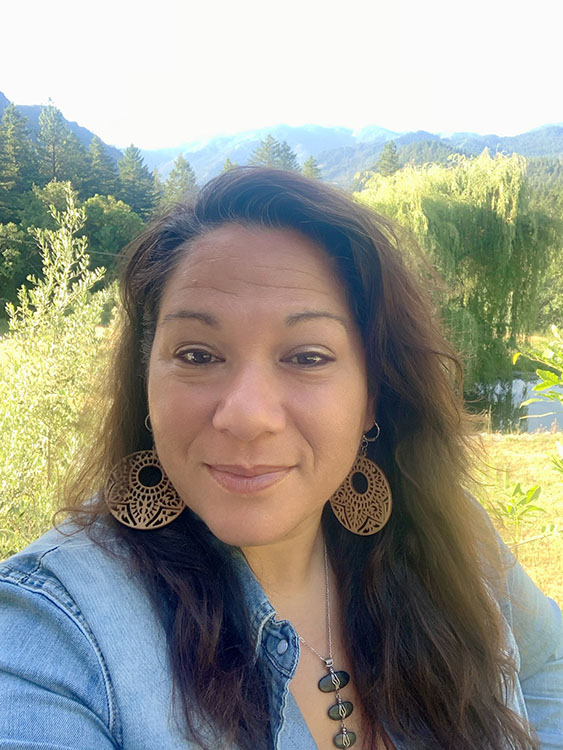 A selfie of a person in an outdoor setting