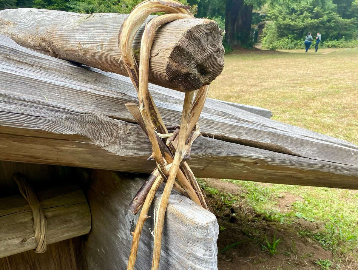 A close-up of some building components lashed together