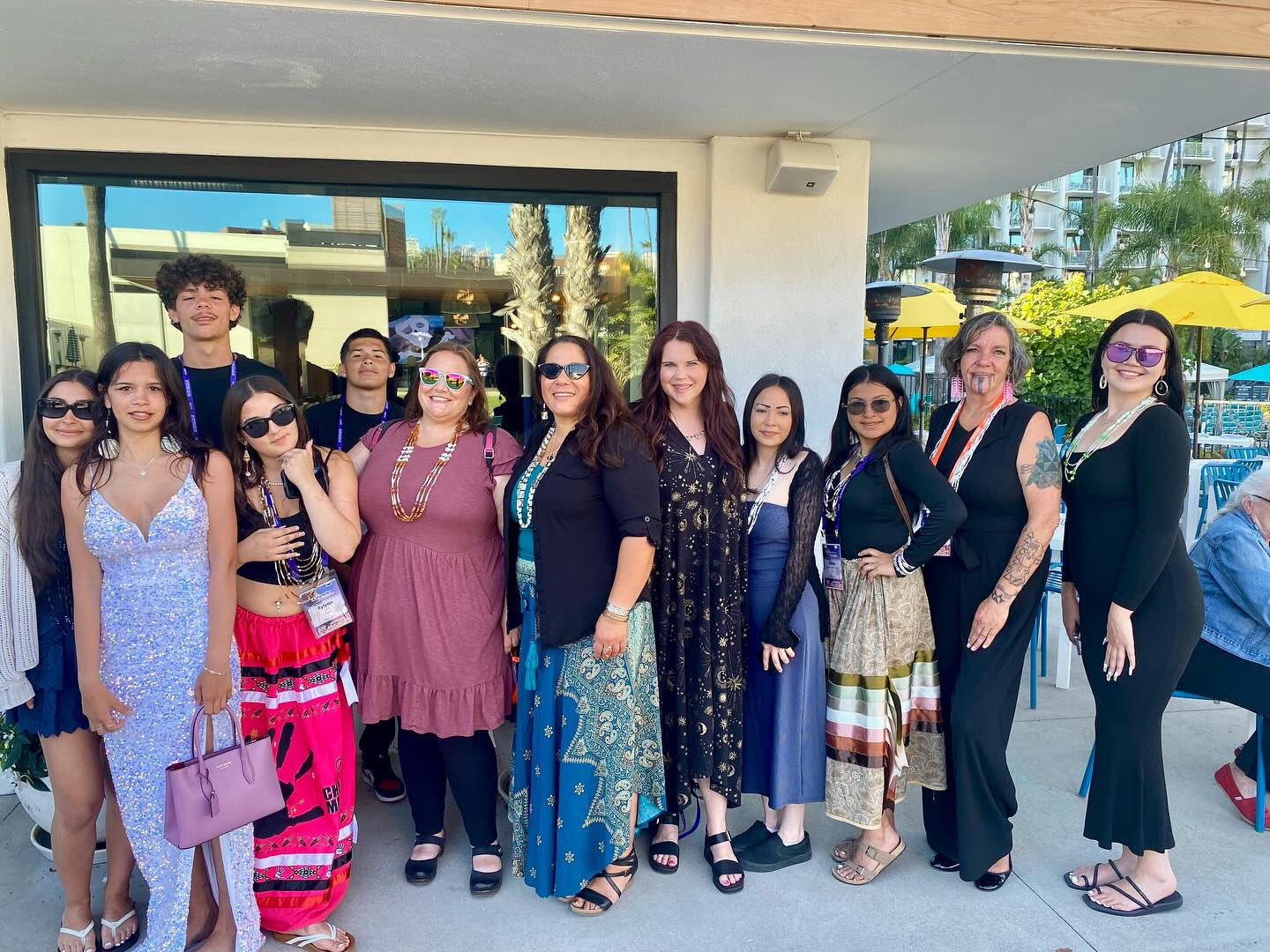 A group of people pose for the camera